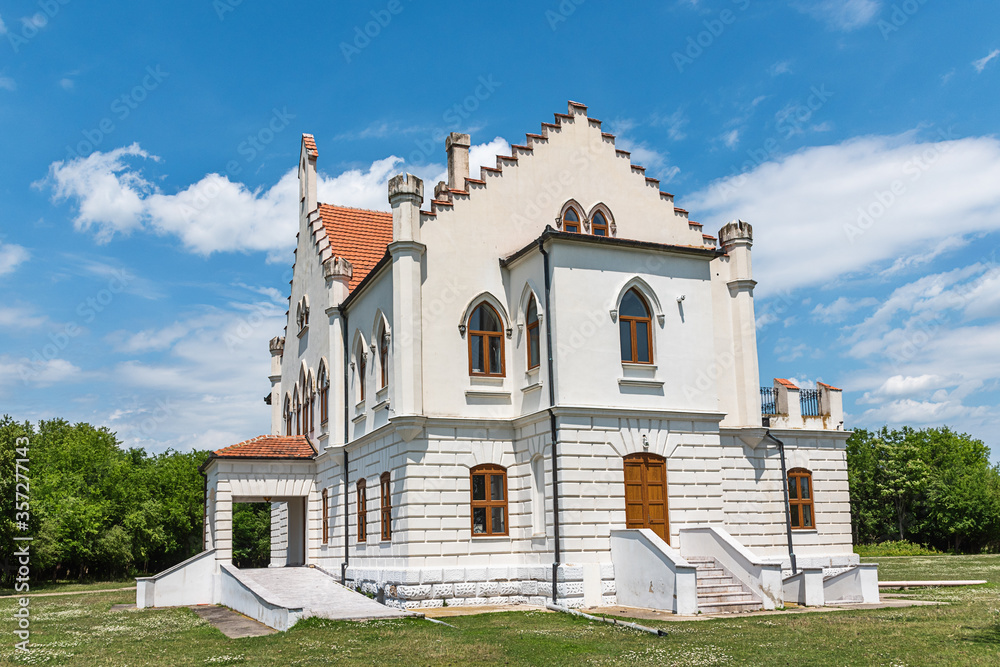 Stari Lec, Serbia - June 04, 2020: Kapetanovo is a Neo-Gothic castle located in the village of Stari Lec, in the Plandiste municipality in northeastern Serbia.
