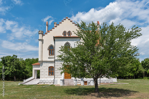 Stari Lec, Serbia - June 04, 2020: Kapetanovo is a Neo-Gothic castle located in the village of Stari Lec, in the Plandiste municipality in northeastern Serbia. photo