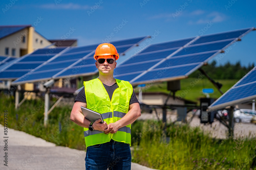 The working state engineering and technical personnel in the new energy base. Solar pannels. The working state engineering and technical personnel in the new energy base. Solar pannels.