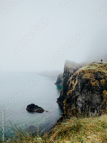 Cliff in a foggy day