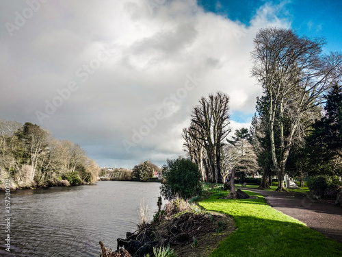River crossing a city park