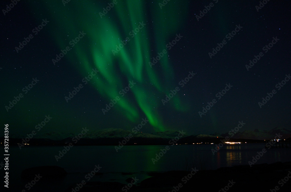 aurora borealis over cold arctic sea