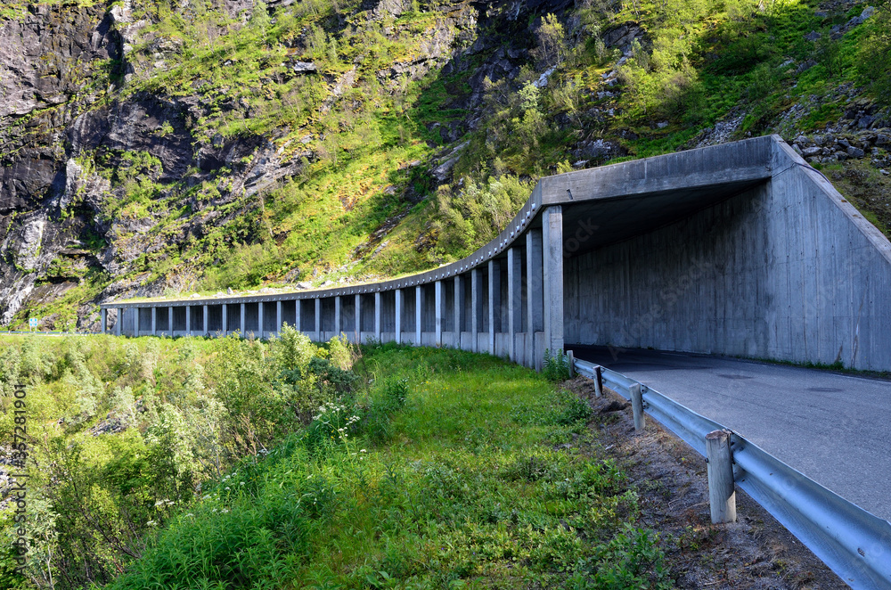 Fototapeta premium semi tunnel in mountain side on senja island for falling rock protection