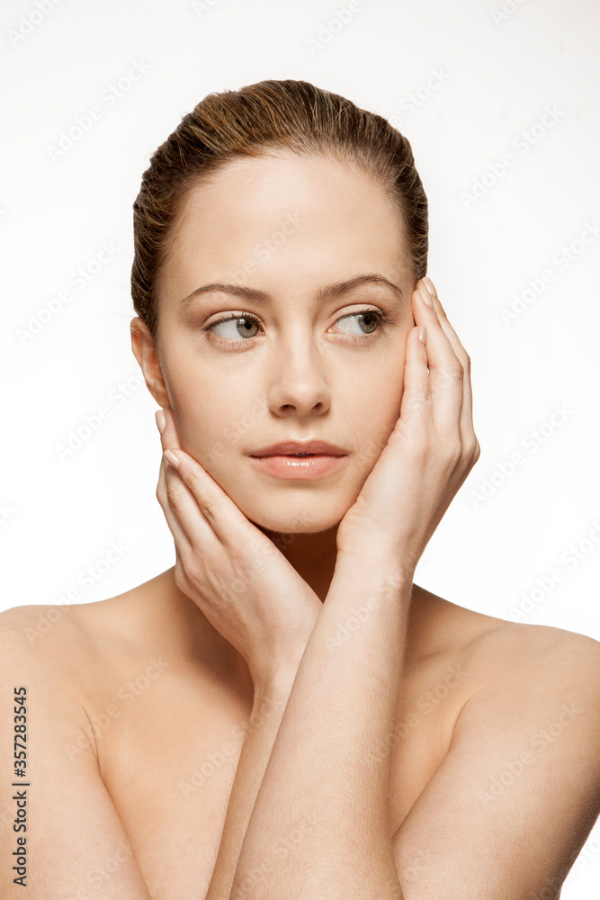 Close up of woman holding her face Close up of woman holding her face