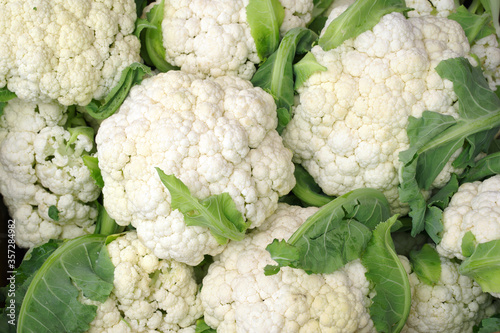 Background with cauliflower. Vegetables in the market