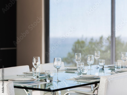 Set table in modern dining room