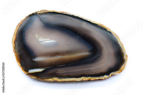 Fotografie Gray-black agate with insignificant inclusions of light crystals