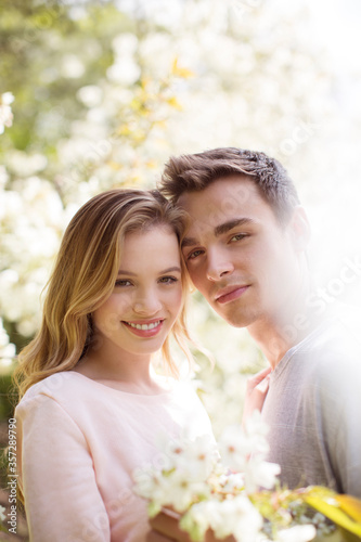 Couple hugging outdoors