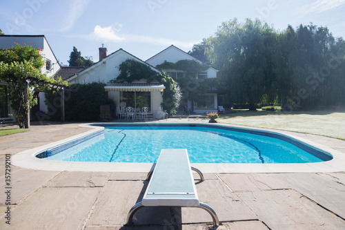 Принти на полотні Diving board at the edge of swimming pool