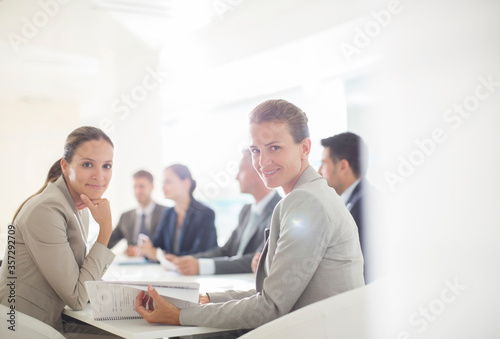 Portrait of confident businesswomen in conference room