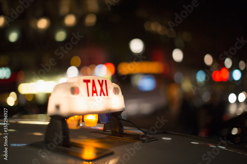 Photographie Close up of illuminated Parisian taxi light, Paris, France