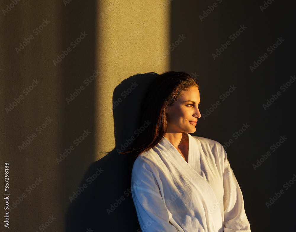 Pensive woman in bathrobe Pensive woman in bathrobe