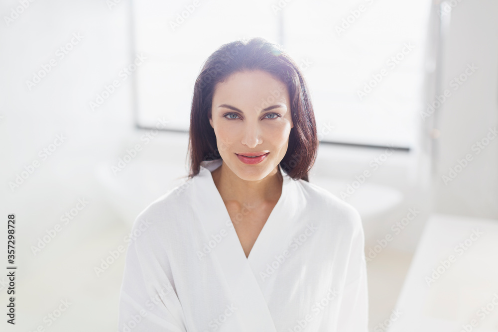 Portrait of smiling woman in bathrobe Portrait of smiling woman in bathrobe
