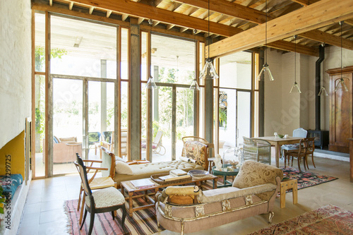 Living and dining area of rustic house