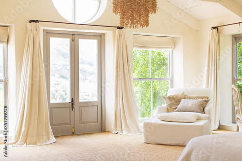 Front door and armchair in rustic house