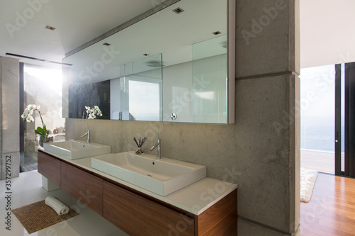 Sinks and mirrors in modern bathroom photo