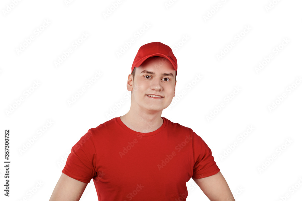 Young handsome confident guy from delivery service in a cap, white background. Young handsome confident guy from delivery service in a cap, white background.