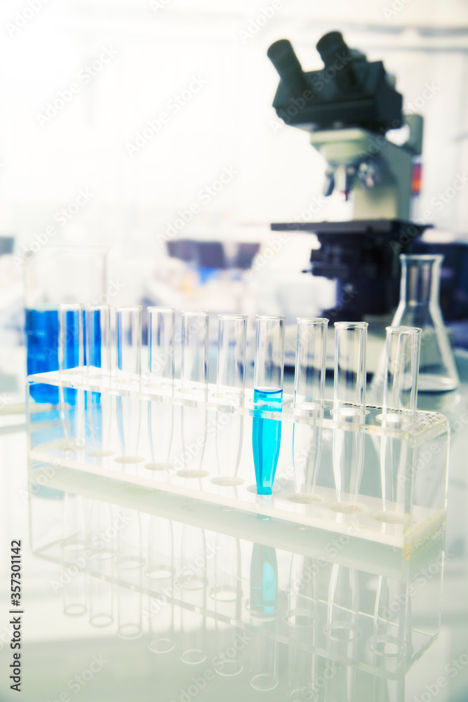 Rack of test tubes with solution in lab