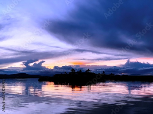 scenic sunset over lake titicaca © OLENA