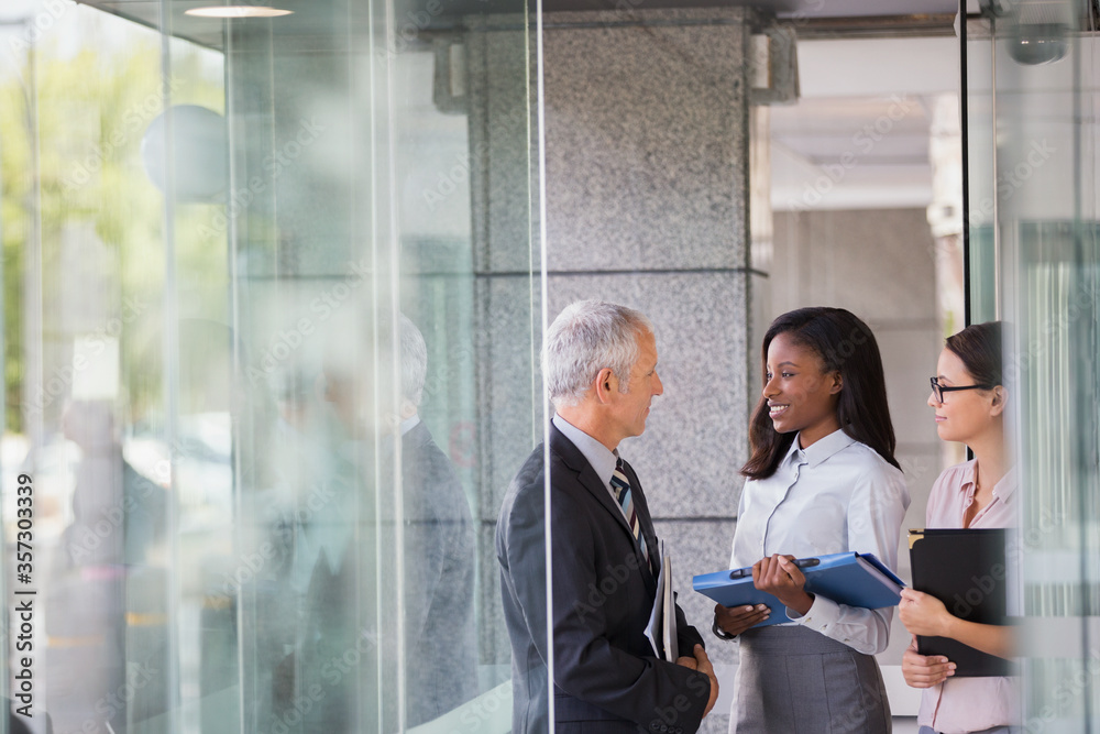 Business people talking in office building