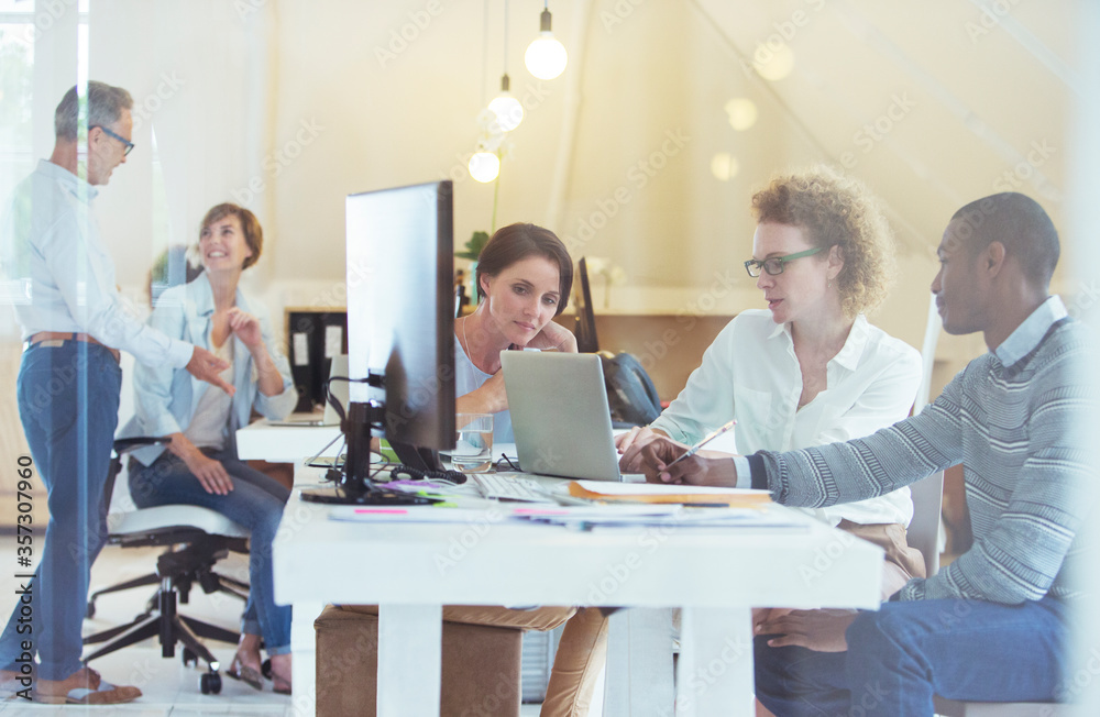 Group of office workers at work