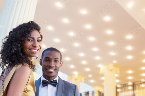 Slika na platnu Portrait of well dressed smiling couple