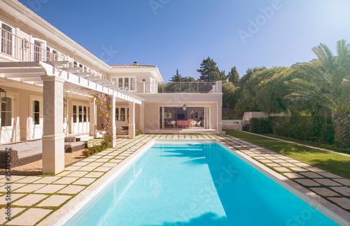 Lap swimming pool along luxury house