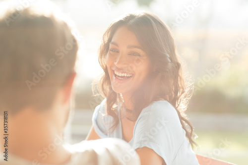 Laughing woman looking at man Free Download Laughing woman looking at man - GFXLoad