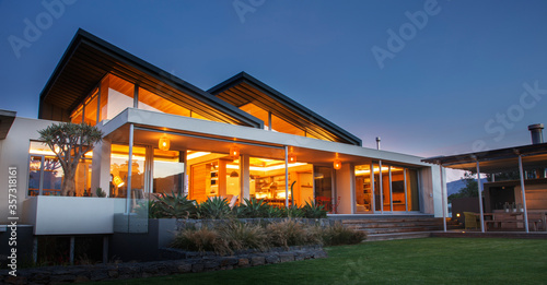 Illuminated luxury modern house at night