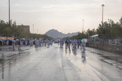 rainy day in Arafat,Hajj, Pilgrims performing Hajj, Islam, Makkah, Saudi Arabia, August 2019 photo
