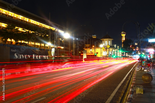 Jalan Asia Afrika in Bandung City  Indonesia at night with light trails.