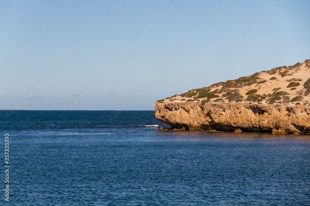 The limestone and blue waters of Point Sinclair in South Australia