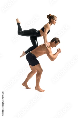 Young couple in sportswear training isolated shot