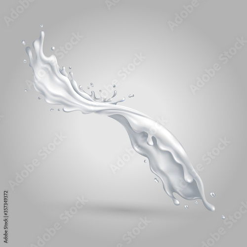 Milky liquid splash on a gray background