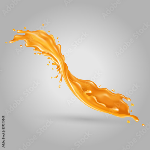 Orange liquid splash on a gray background