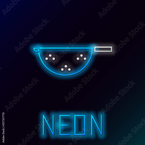 Glowing neon line Kitchen colander icon isolated on black background. Cooking utensil. Cutlery sign. Colorful outline concept. Vector