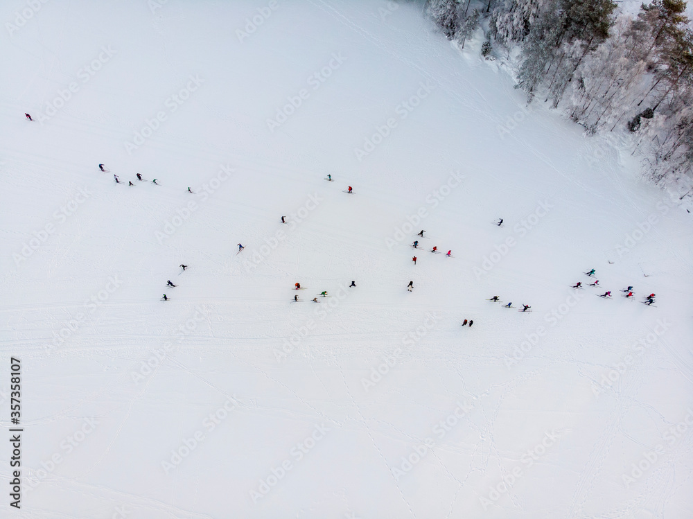 Cross country skiers on a frozen lake in Norway Cross country skiers on a frozen lake in Norway