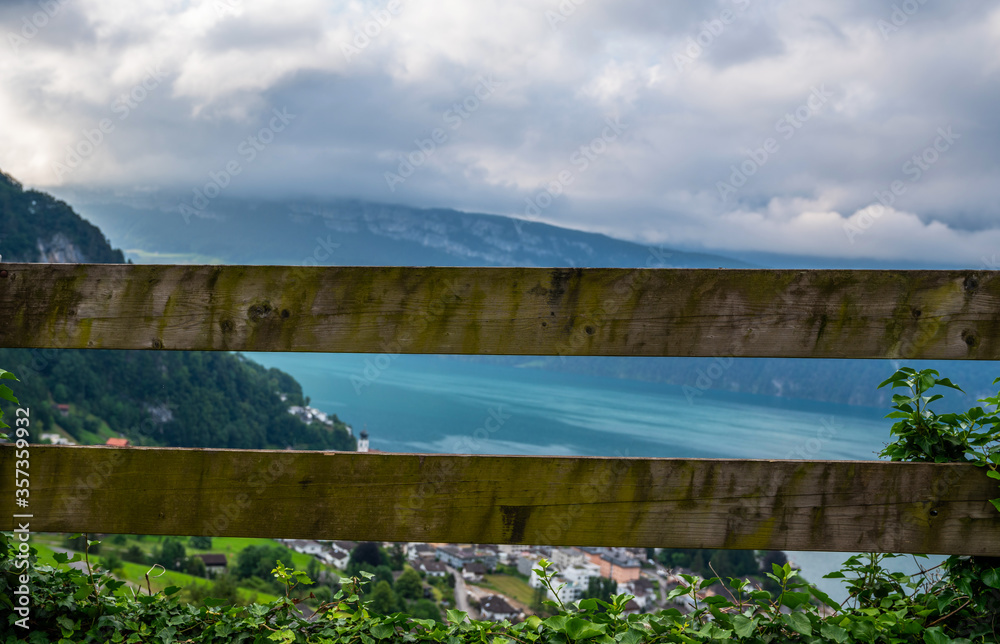 View of Lake Lucerne with Gersau town and Swiss Alps in the background. Canton of Schwyz, Switzerland. View of Lake Lucerne with Gersau town and Swiss Alps in the background. Canton of Schwyz, Switzerland.