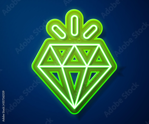 Glowing neon line Diamond icon isolated on blue background. Jewelry symbol. Gem stone. Vector.