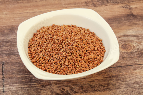 Raw buсkwheat cereal in the bowl