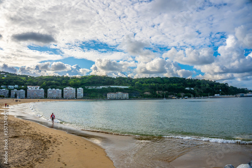 People strolling on the beautiful beach of Fuenterrabia, Guipuzcoa. Basque Country photo