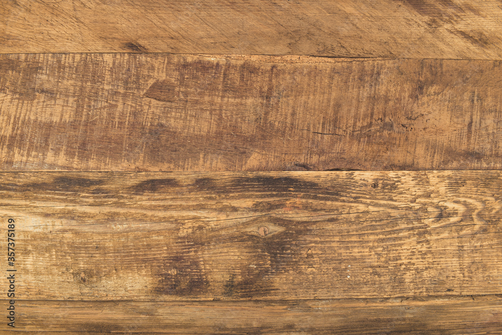 Naklejka premium Brown wooden plank surface for background