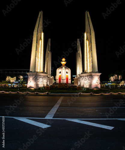  Democracy Monument by night without people and traffic, Bangkok, Thailand