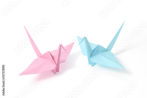 Origami Bird, bird paper crane on pink background 3d rendering. 3d illustration pair of bird paper craft for Hiroshima remembrance day minimal style concept.