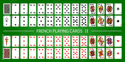 Poker set with isolated cards on green background. 52 French playing cards with jokers.
