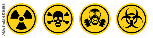 Danger warning yellow sign. Radiation sign, Gas mask, Toxic sign and Bio hazard. Vector icon isolated on white background. photo