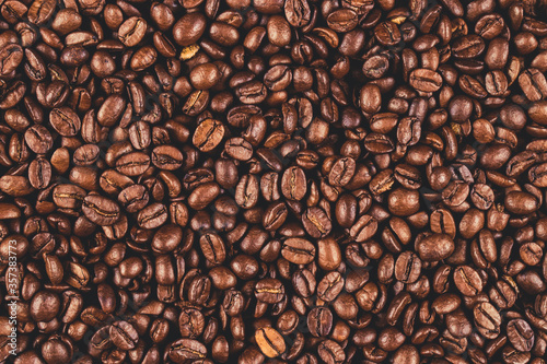 Top view of coffee beans. Coffee beans on the flat surface.