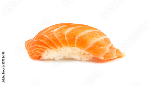 Close up one nigiri sushi with salmon on white