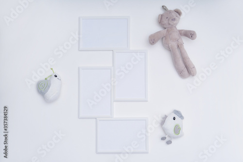 White mock up frame and toys on white background Child concept Copy sapce
