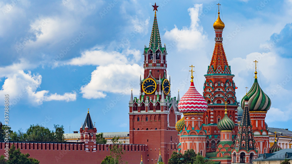 Moscow. Russia. Red square of Moscow. St. Basil's Cathedral. Moscow Kremlin. Spasskaya tower of the Kremlin with chimes and a star. Sights of the Russian capital.
